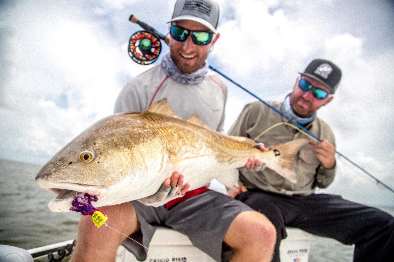 Dock light redfish on the fly : r/Fishing